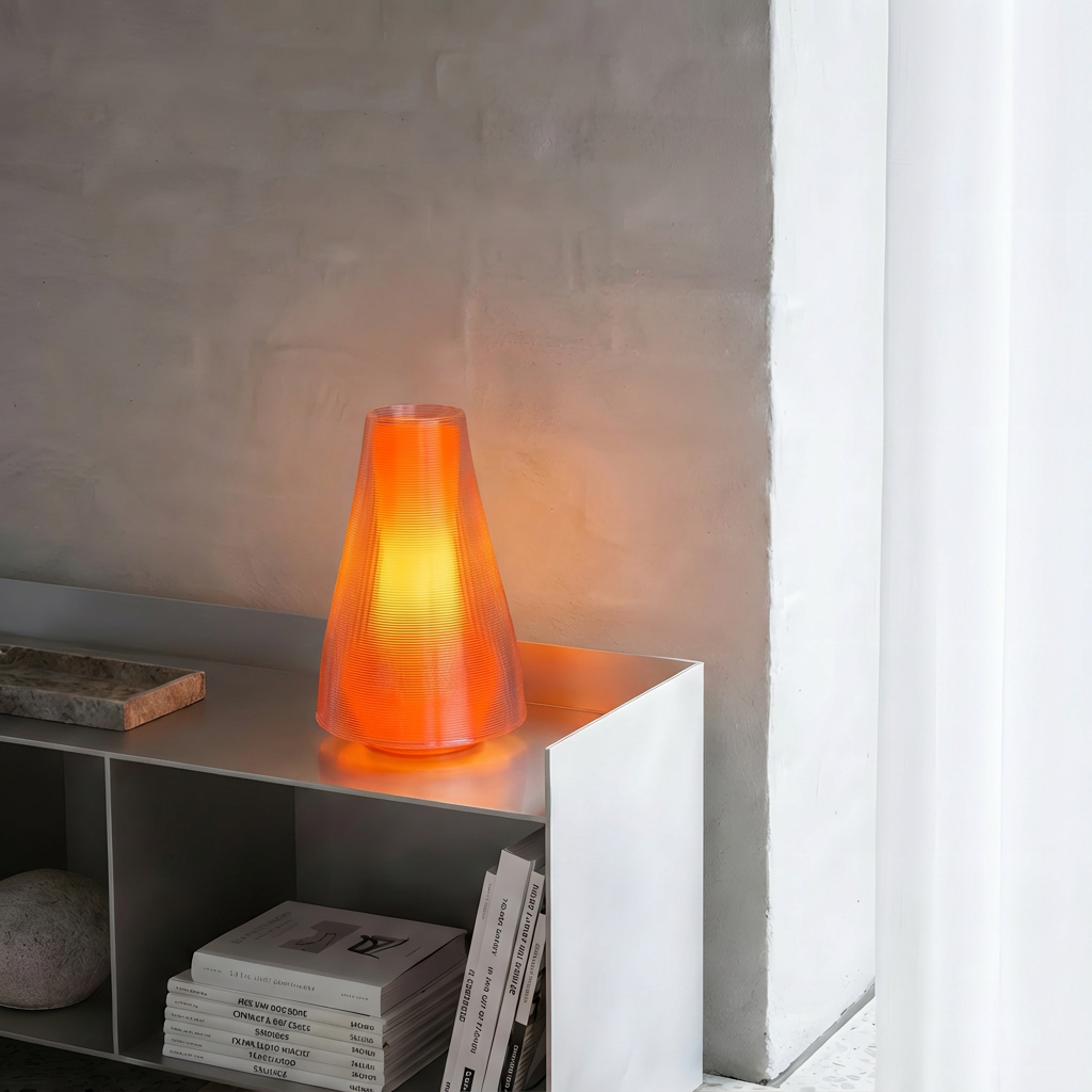 BACKLAN lamp — translucent shell glowing warm